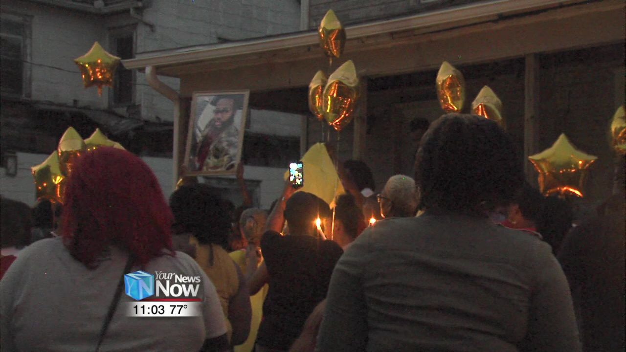 Candlelight vigil held for murdered correctional officer.jpg